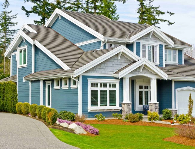 siding company in mansfield home with blue siding