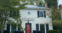 roofers Mansfield OH home with roof replacement and siding contractor installation