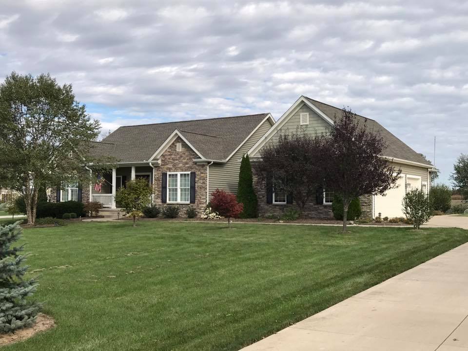 roofing company fall maintenance home with shingle roof