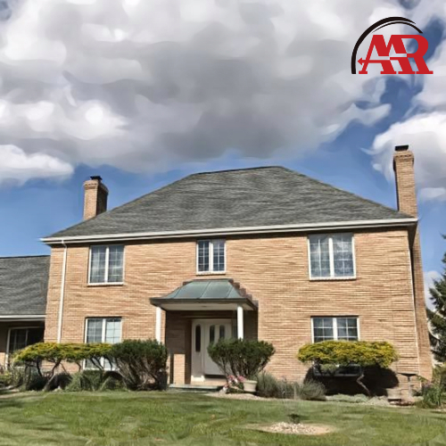 roofing contractors in akron ohio brick home with shingles roof