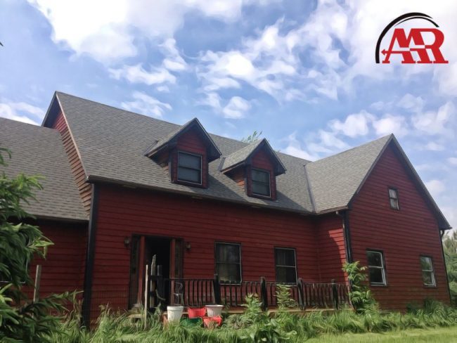 roof damage storm claim home with shingle roof