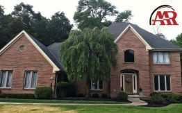masonry careers mansfield brick home with willow tree in front