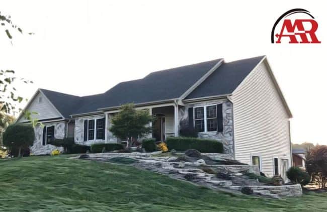 roofers near me Mansfield home with shingle roof and vinyl siding