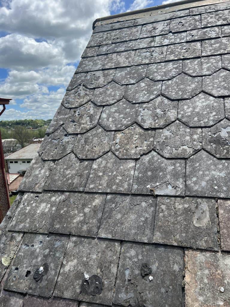 hail damage on slate roofing