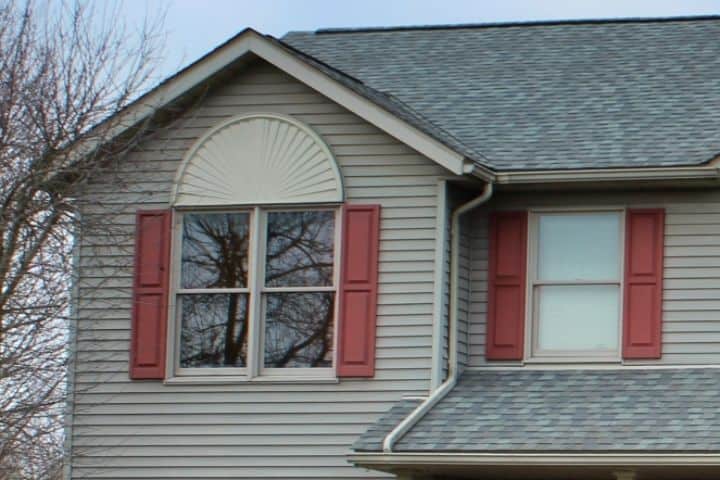 gray home with new siding done by siding contractors